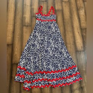 NWOT beautiful summer dress. Navy and white pattern with red accent and straps.